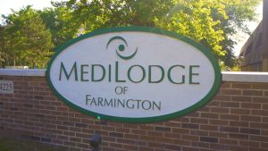 Medilodge of Farmington sign outside the building.